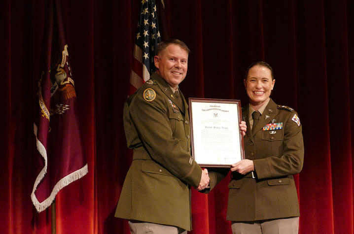 Photo of Col. Murray Receiving Certificate