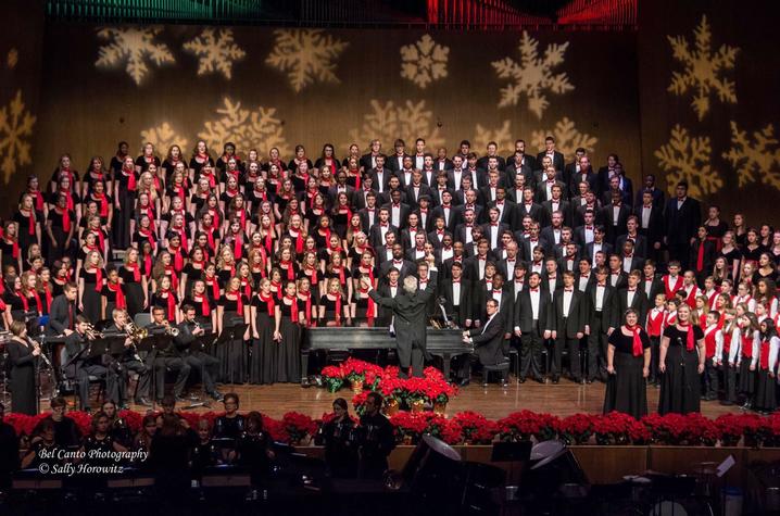 photo of 2 soloists performing before UK Choirs and Lexington Singer's Children's Choir at Collage