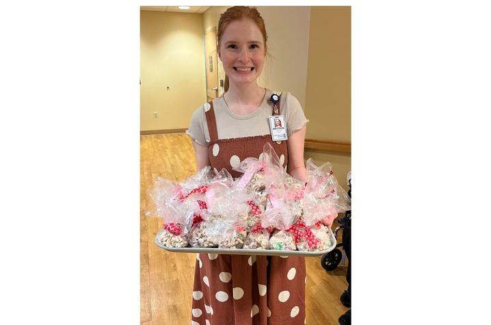 Madison served treats to the nursing home residents while she worked at Nazareth Home of Louisville. She loved interning there during the summer of 2022. Photo provided by Debra Becknell.