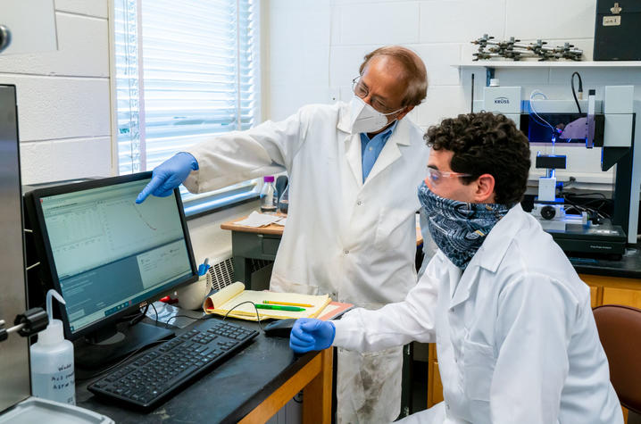 UK engineering professor Dibakar Bhattacharyya, or "DB," directing research in his lab. With co-researchers, DB is creating a membrane-based medical face mask for COVID-19. Photo by Ben Corwin, Research Communications