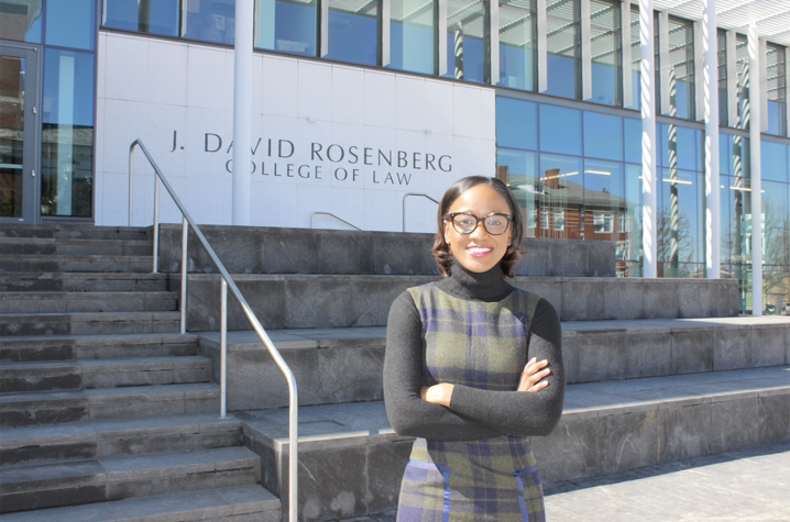 Kelly Daniel pictured in front of Rosenberg Law building on UK's campus