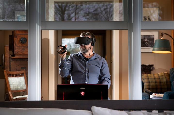 Assistant Professor David Stephenson conducts an online class on virtual reality in his house on March 24, 2020.