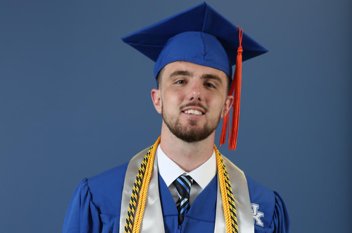photo headshot of Dillon Pulliam in graduation cap and gown