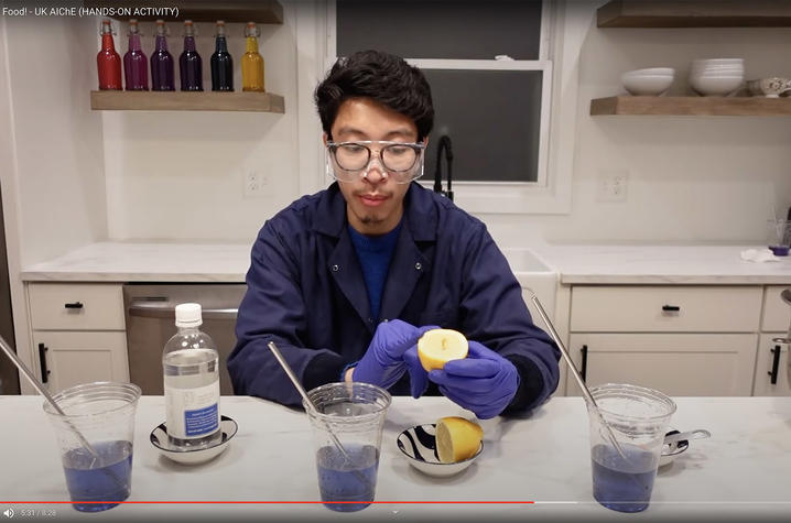 Photo of Faculty Member Doing Experiment