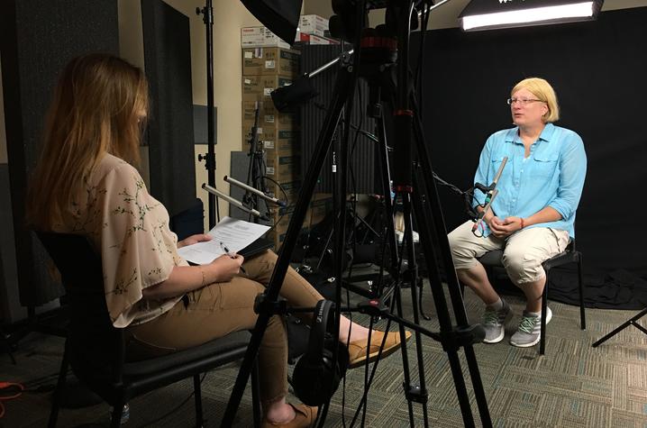 photo of Emily Duncan interviewing Megan Buell