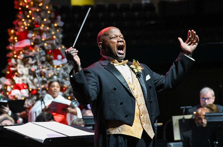 photo of Everett McCorvey conducting and singing at 2021 Celebration of Song