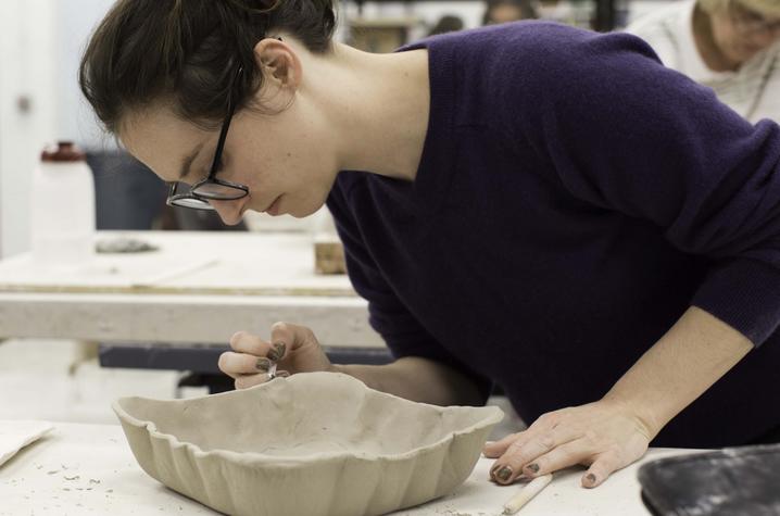 photo of student working in ceramics class - Fine Arts Institute