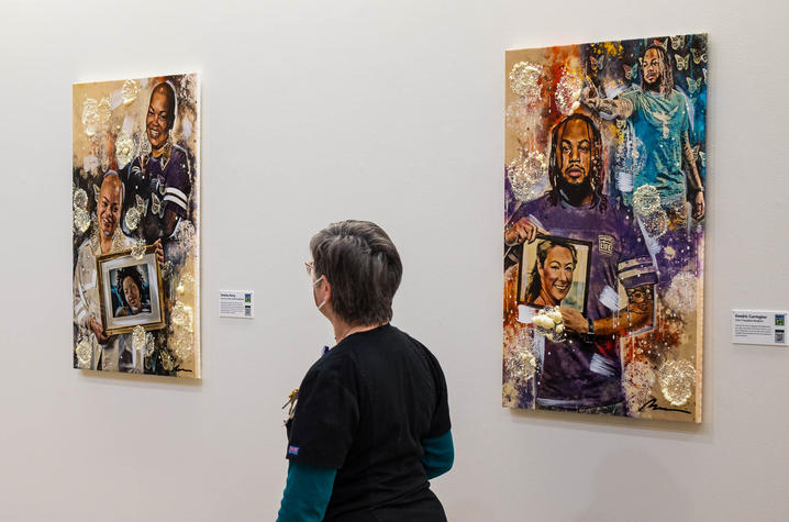 image of hospital worker looking at portraits