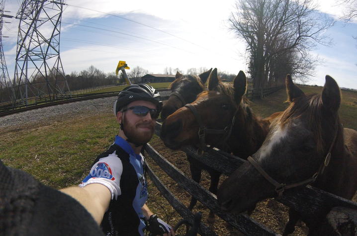 selfie photo of Nate Williams with horses
