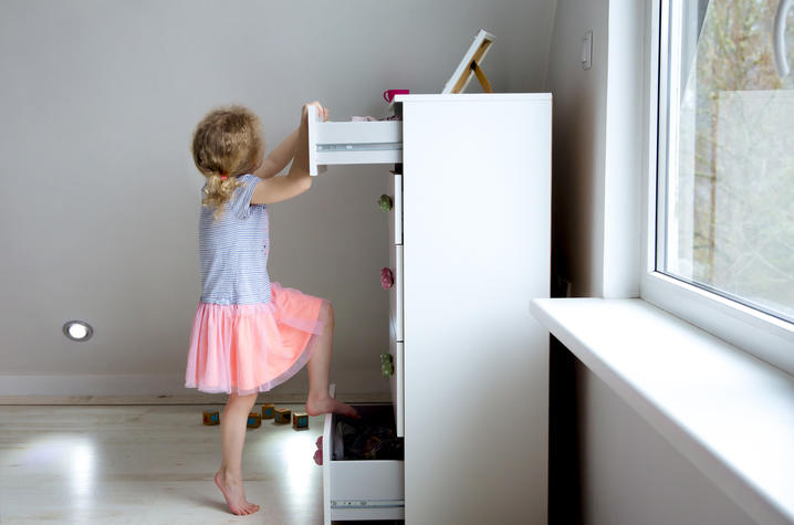 kid climbing furniture