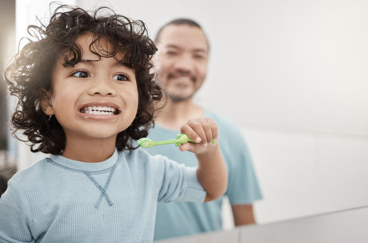 kid brushing teeth