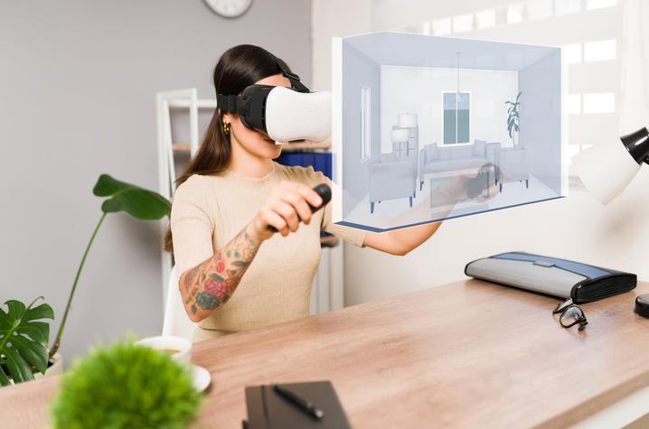 Photo of Woman Using VR Headset