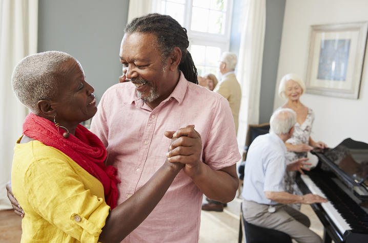 photo of older couple dancing