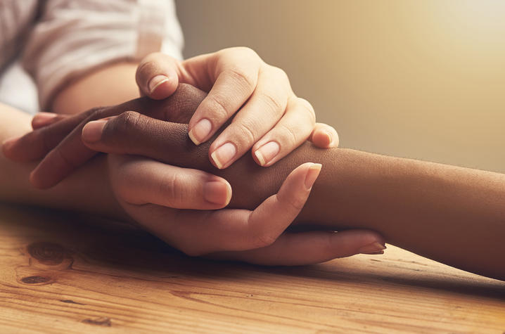 stock image of people holding hands