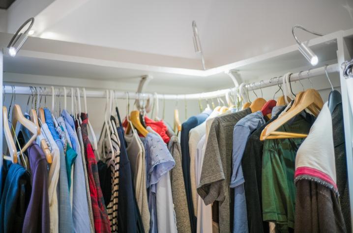 photo of clothing hanging on rack