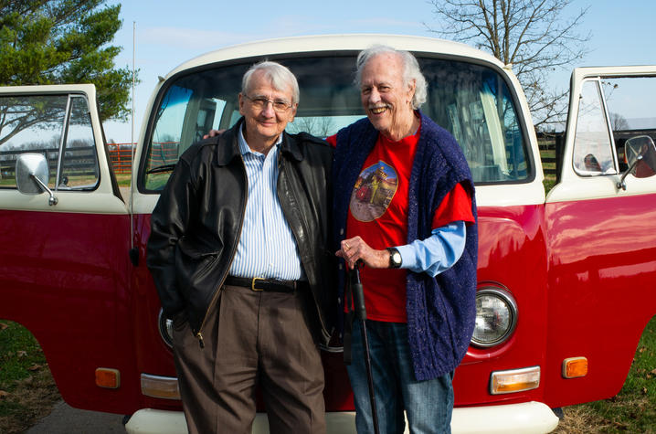 photo of Gurney Norman and Ed McClanahan in front of VW van