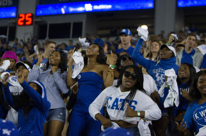 Students cheering on UK's football team. Mark Cornelison | UK Photo.