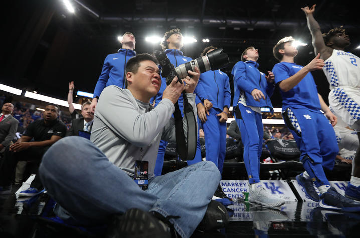Michael Huang capturing photos at the UK  men's basketball game vs. Utah at the T-Mobile Arena in Las Vegas on Dec. 18, 2019.