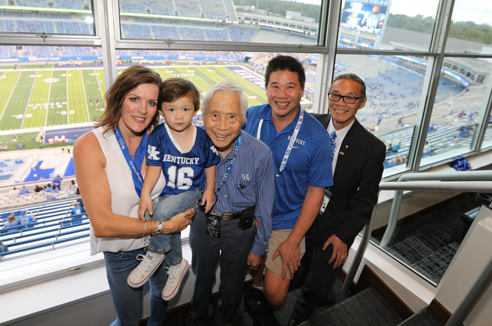 UK football game at Kroger Field, L to R: Michelle Huang, Gabriel Huang, Yang "Pete" Huang, Michael Huang, and John Huang. 