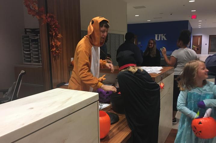 photo of children trick-or-treating in a residence hall