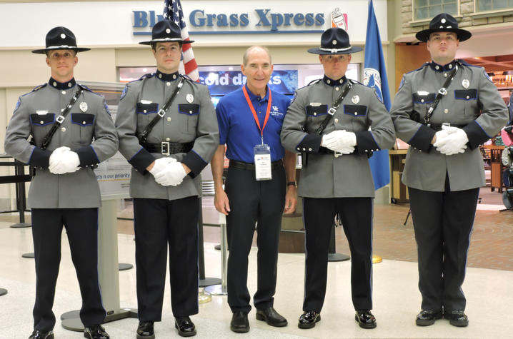 photo of UK Police Honor Guard with UK President Eli Capilouto