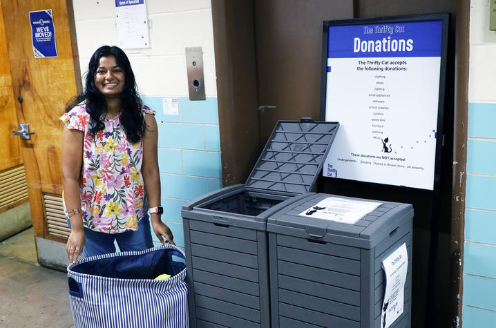 Nikki Shah, an accounting freshman, collected donations while volunteering at The Thrifty Cat. 