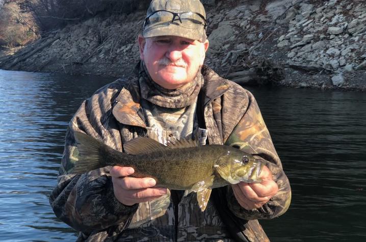 michael stalker holding a fish