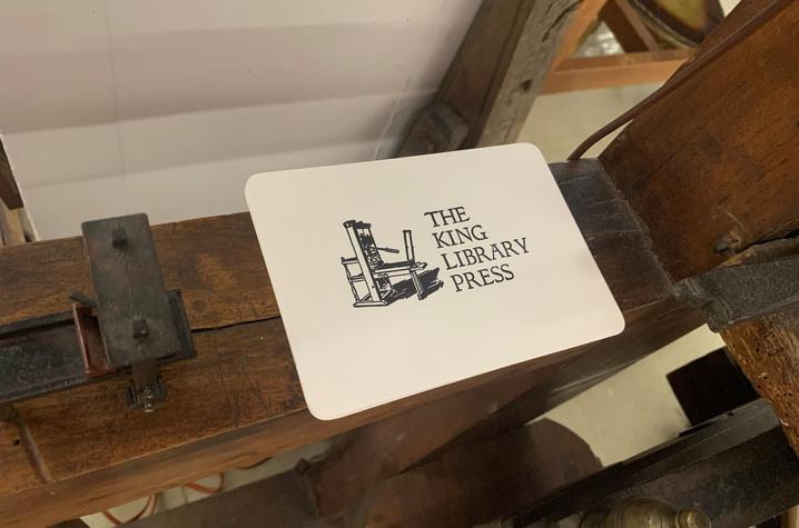 photo of print with image of press and the words "The King Library Press"