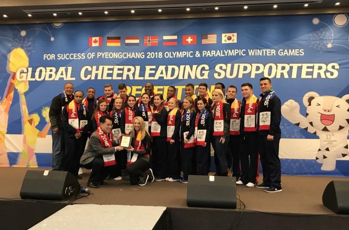 This is a photo of the UK Cheerleaders, representing USA Cheer & Team USA, at the 2018 Winter Olympics.