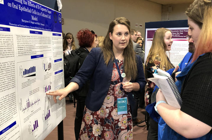 UK junior Marygrace Duggar is shown presenting her e-cigarette research poster at NCUR 2018.