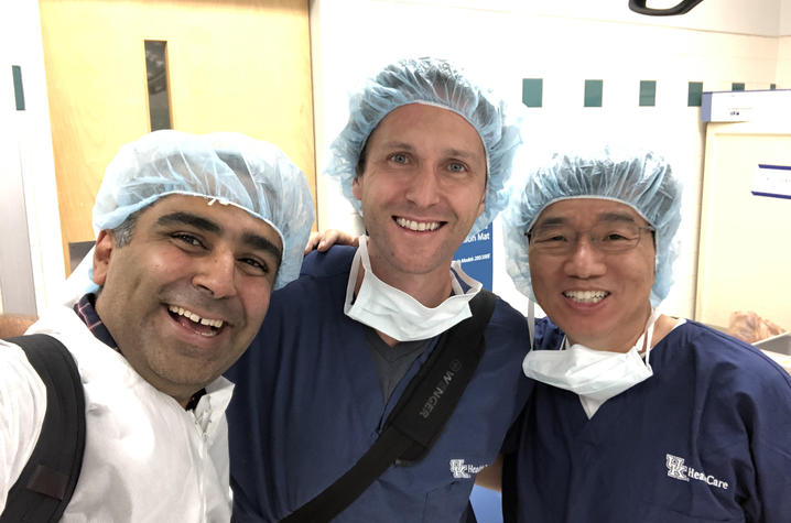 photo of three doctors in surgical scrubs