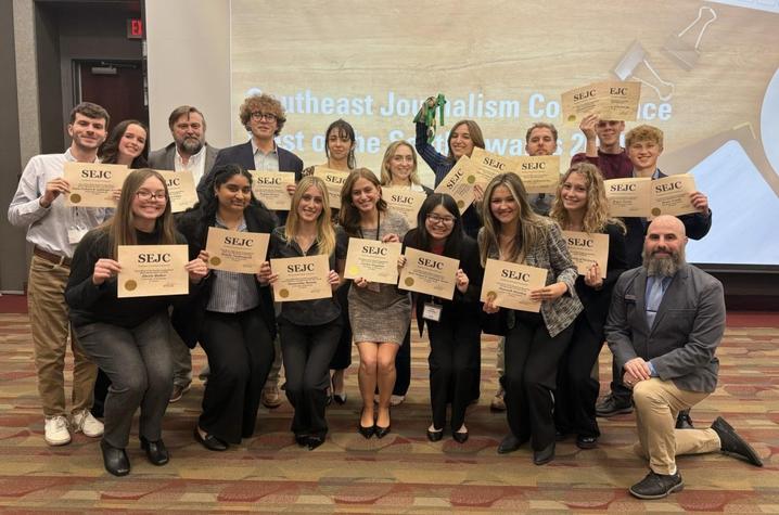Students standing with their awards. 