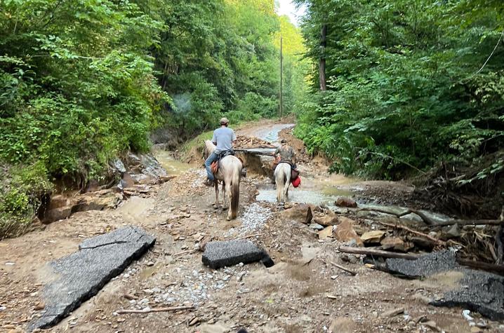 Community members delivering supplies to stranded flood survivors in July 2022. Photo provided.