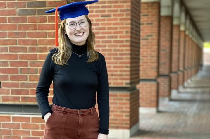 photo of Kyra Seevers wearing mortar board