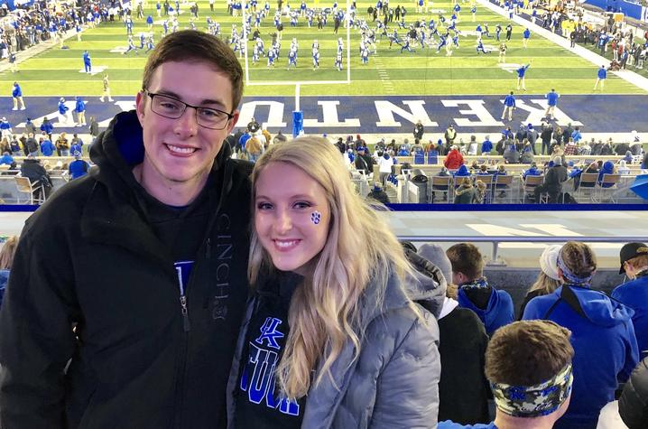 Cody (left) and Jenna Burke (right) at Kroger Field