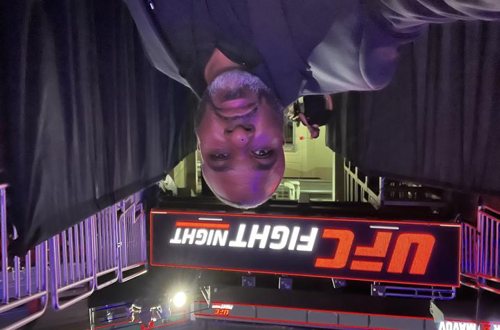 While working ringside at UFC Fight Night, Perry’s job was to ensure the safety of the participants during the competition. Photo provided by Dwan Perry.