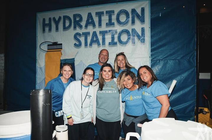 DanceBlue volunteers assist with tasks like manning the water stations so dancers have everything they need to stay on their feet all marathon long. Photo provided by DanceBlue.
