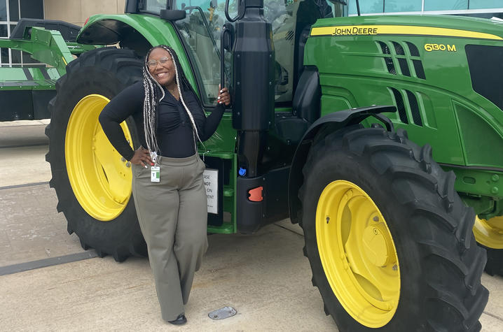 Jakayla Allen with tractor 