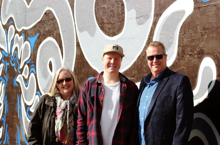 photo of Lee Ann Paynter, Ben Darlington and Mark Fichtner in front of Darlington's mural on Carson's