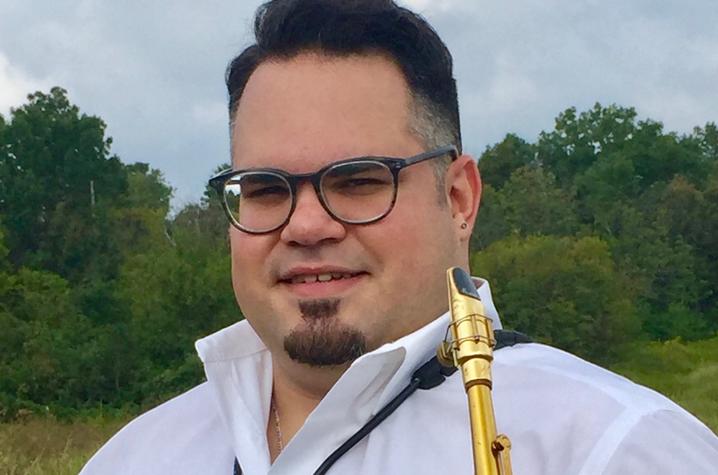 photo of Ian Cruz with saxophone