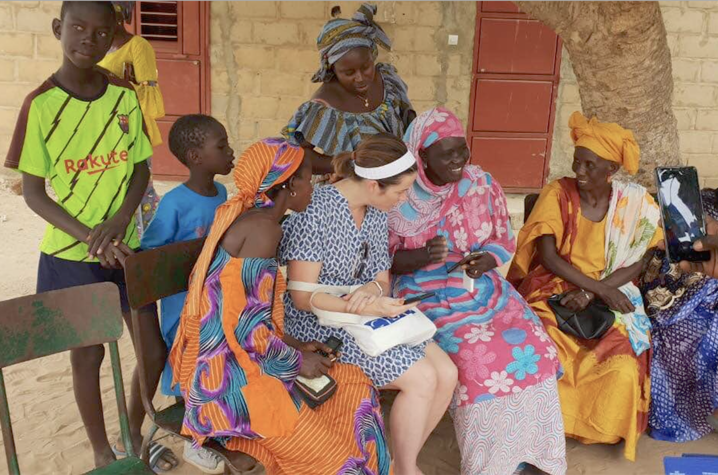 Jamie Zimmerman in Senegal, listening to women share how to make mobile financial services work better for them.
