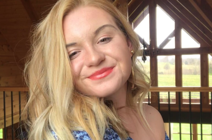 headshot photo of Jessica Lamb with window behind her