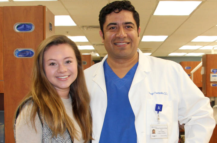 Joy (left) stands next to Dr. Fuentealba (right)