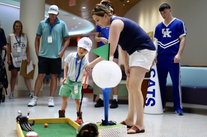 Everett worked through the course with his mom and brother in tow and his style of golf brought plenty of smiles to the pros. Carter Skaggs | UK Photo