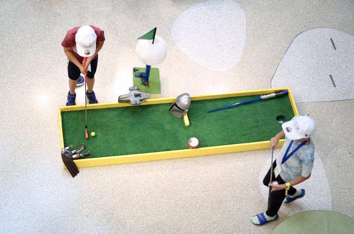 Nine holes of miniature golf wound through the floors of KCH. Each with a different theme — including Star Wars. Carter Skaggs | UK Photo