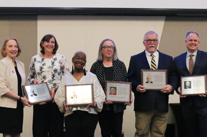 From left, Sheldon Shafer (represented by two of his former coworkers), Betty Winston Bayé, Deborah Taylor Givens, Paul Prather and Peter Baniak. Not pictured: Elizabeth “Scoobie” Ryan and Kyle Vance.