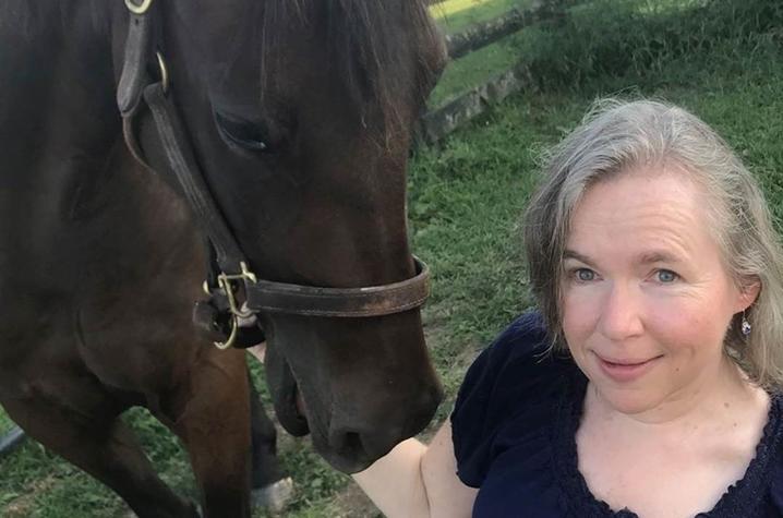 Photo of Kathy Sheppard-Jones with her horse.