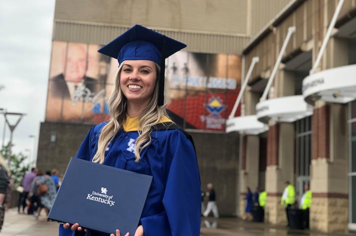 Kelci McHugh holding degree 