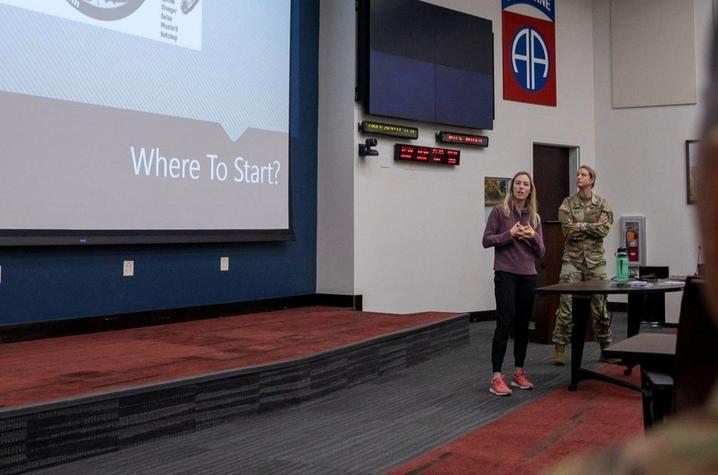 Kelci McHugh presenting to soldiers