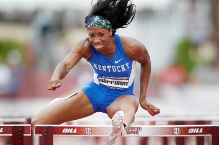 photo of Keni Harrison running hurdles for UK 